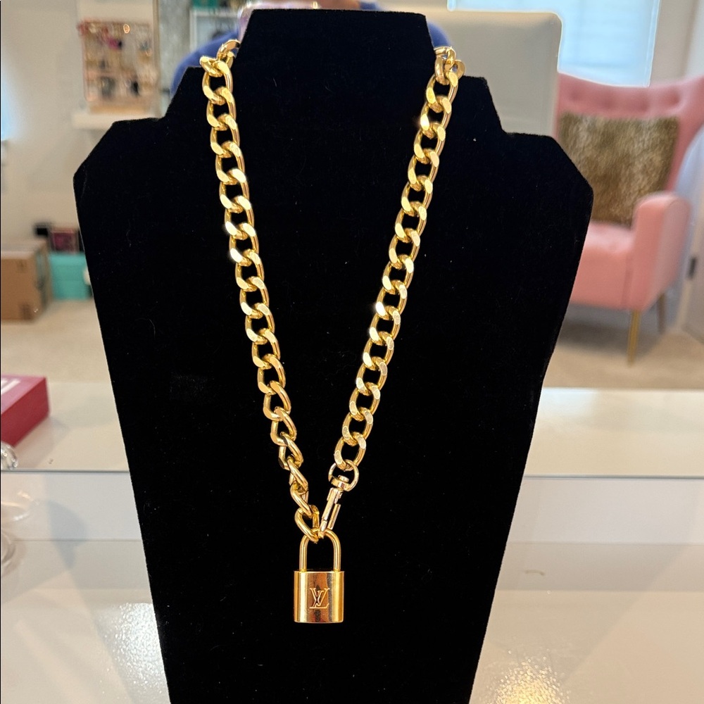 Louis Vuitton padlock and key